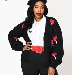 Stylish Black Cardigan with Red Heart Details